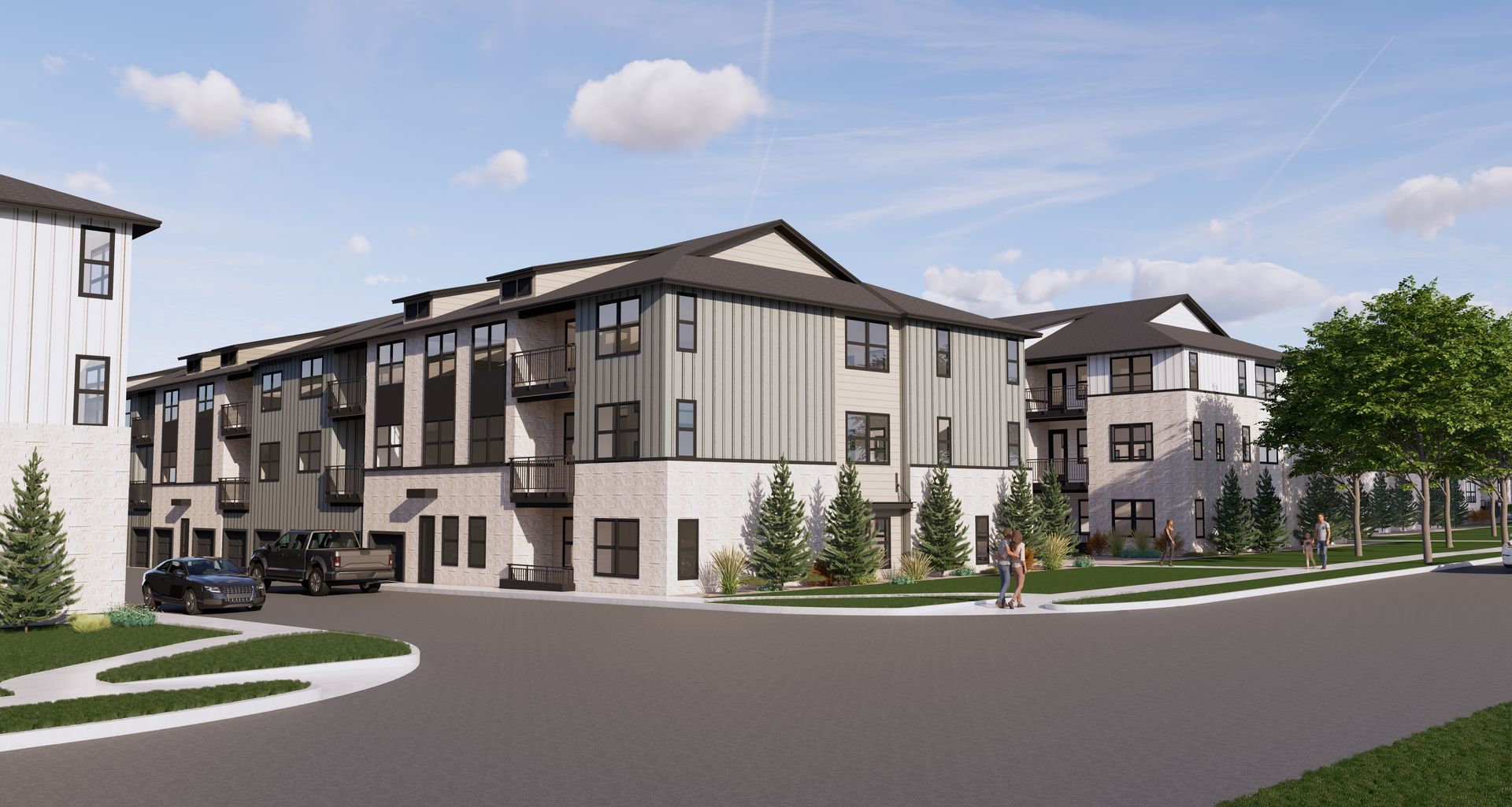 Modern apartment complex with beige and gray buildings, a driveway, young trees, and a blue sky