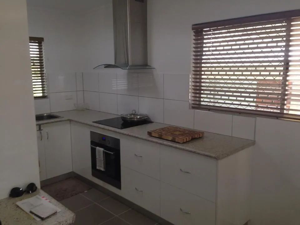 White Kitchen With Stainless Steel — Keilbach Kitchens In Garradunga, QLD