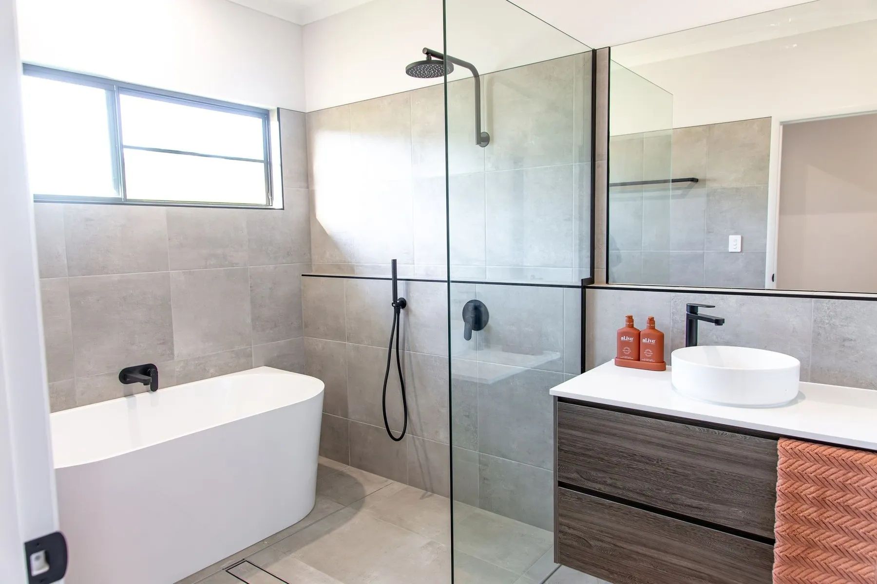 Modern Bathroom With a Bathtub — Keilbach Kitchens In Garradunga, QLD
