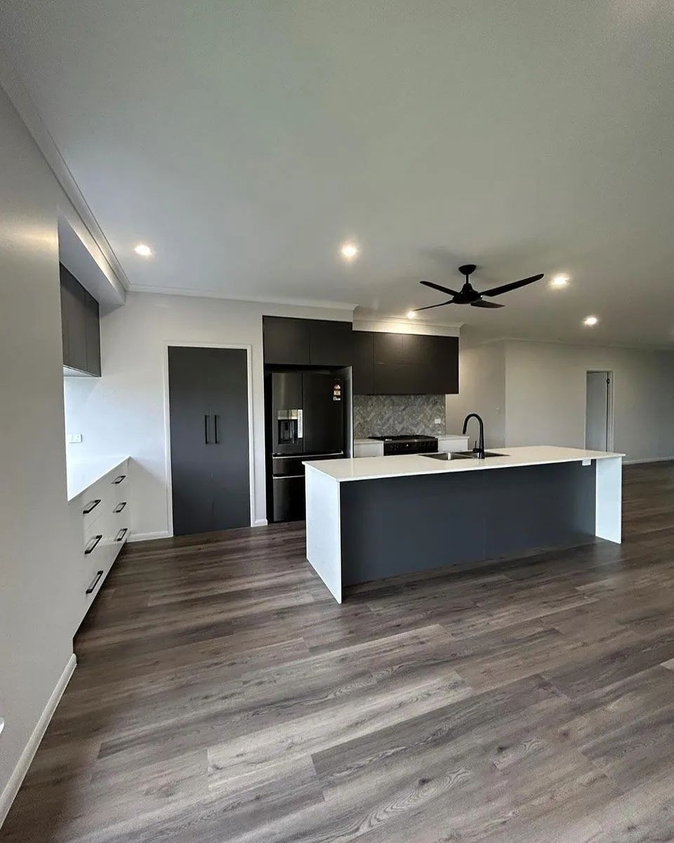 Modern Kitchen With Dark Gray Island — Keilbach Kitchens In Garradunga, QLD