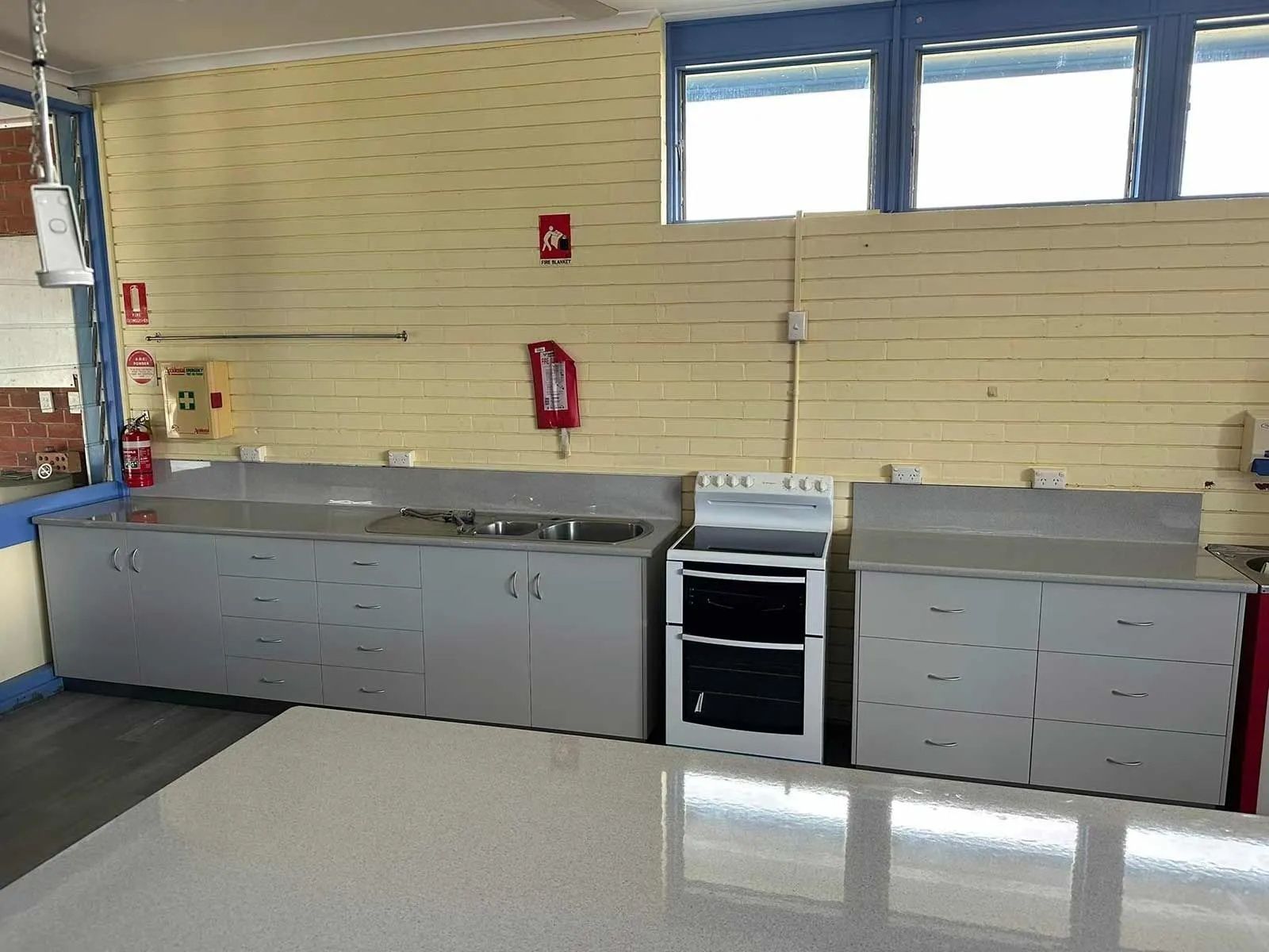 Kitchen With Light Yellow Walls — Keilbach Kitchens In Garradunga, QLD