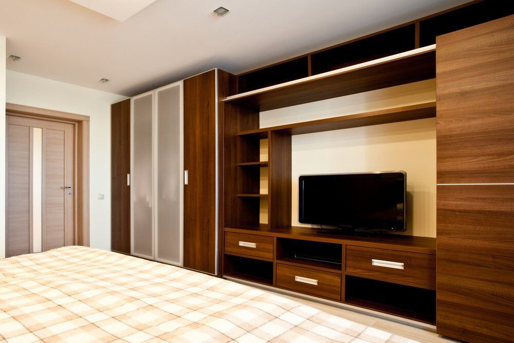 Bedroom With Wooden Built-in Furniture — Keilbach Kitchens in Cairns, QLD