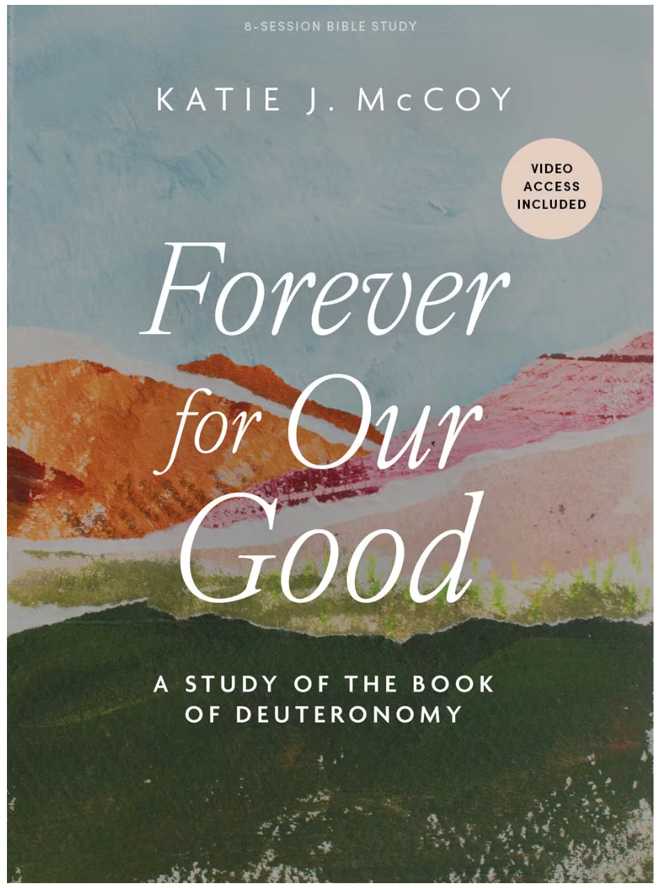 Book cover: “Forever for Our Good” by Katie J. McCoy, with pastel hills and trees on a blue background