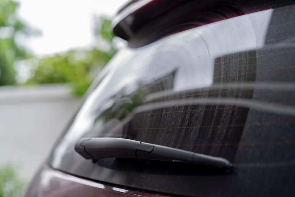 A Close up Of the Back Window of A Car with A Wiper Blade — A1 Windscreens in Tamworth, NSW