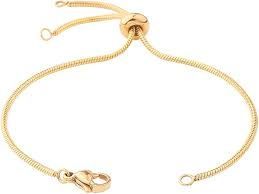 Pulsera de oro con nudos deslizantes ajustables y cierres en los extremos.