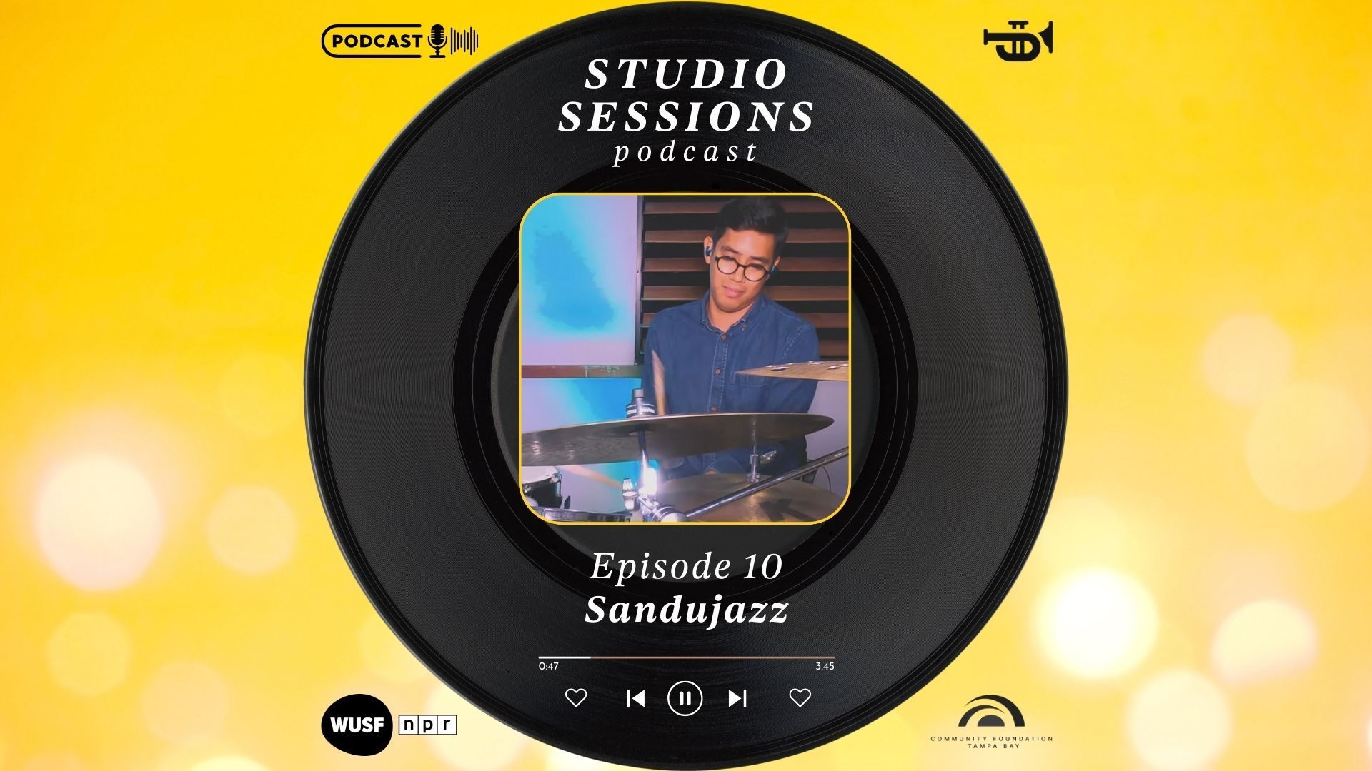 A man is playing drums in a studio sessions podcast