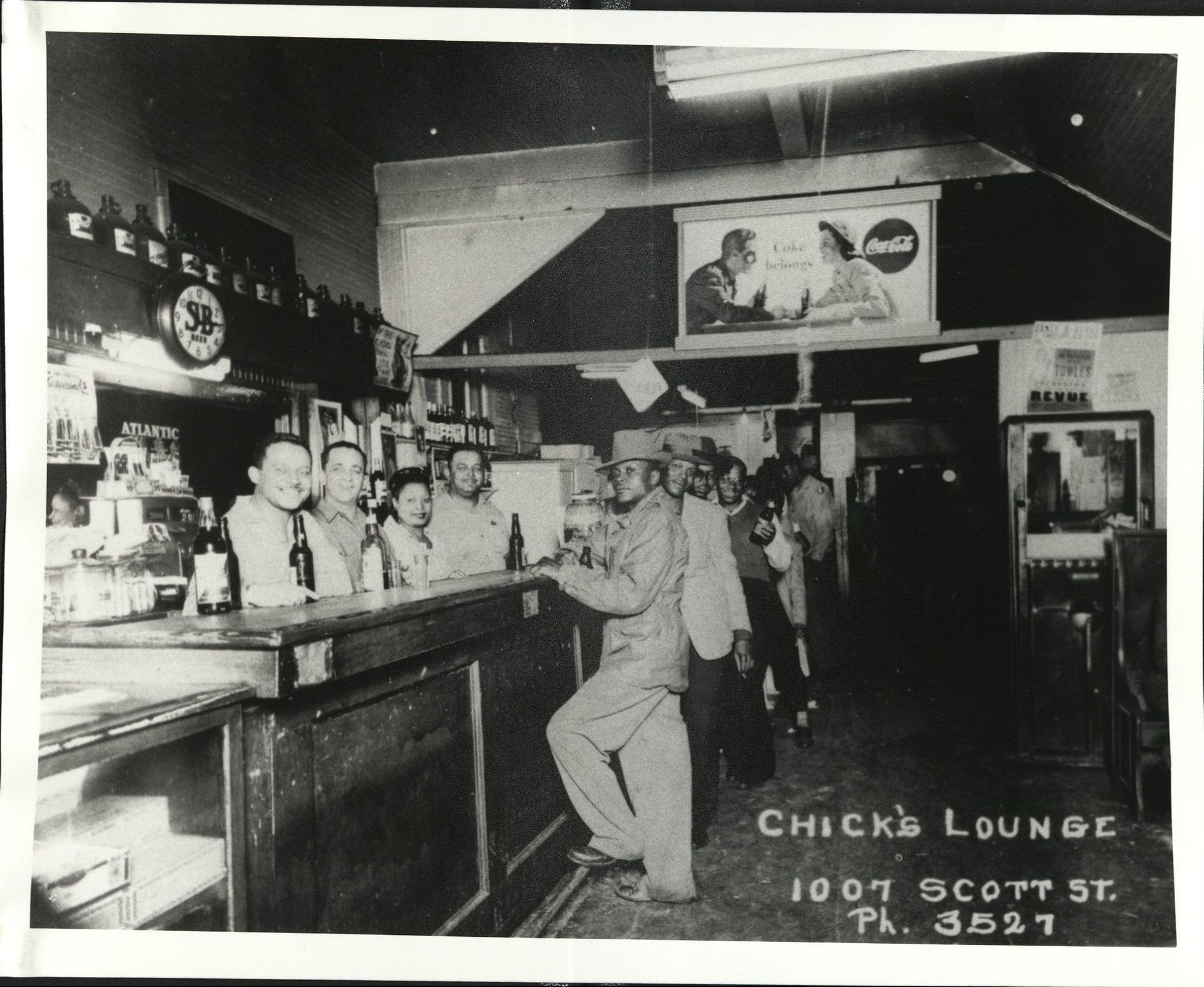 A black and white photo of the chicks lounge