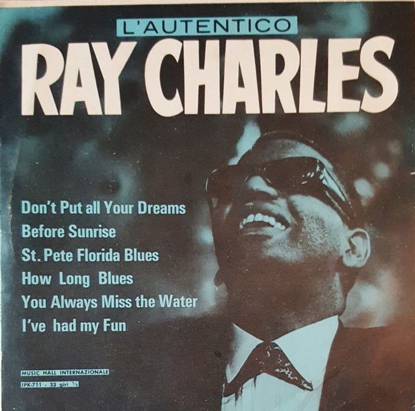 A ray charles album cover shows a man in a suit and tie