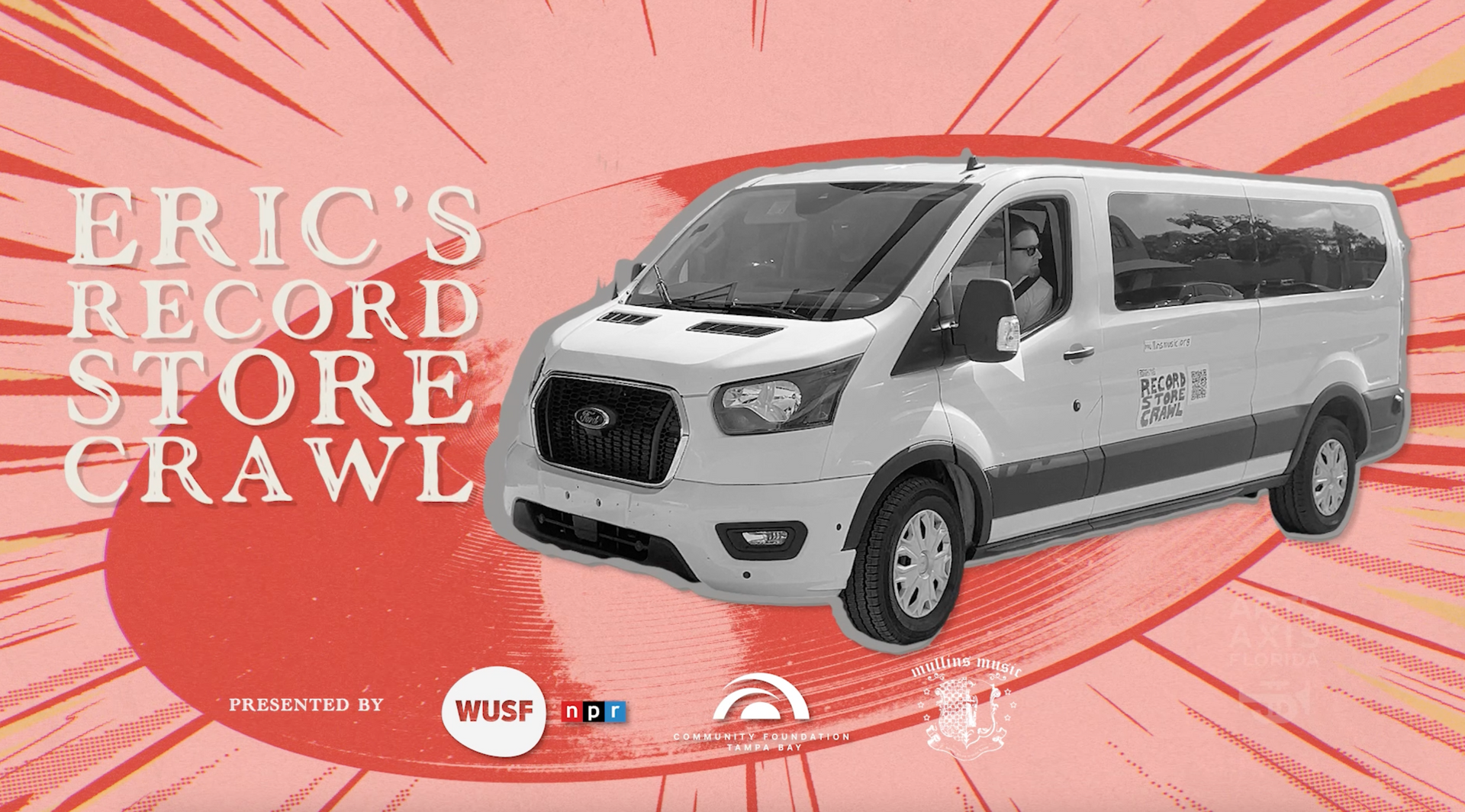 A white van is parked in front of a red background.