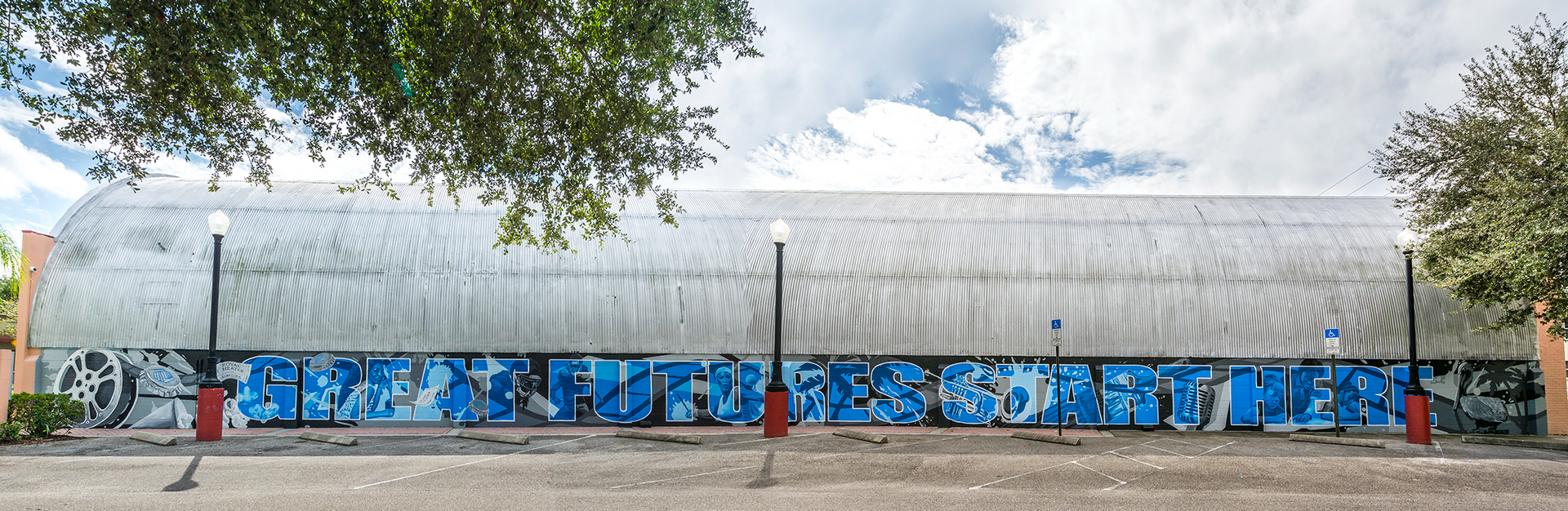A large building with graffiti on the side of it.
