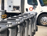 Large bins next to truck