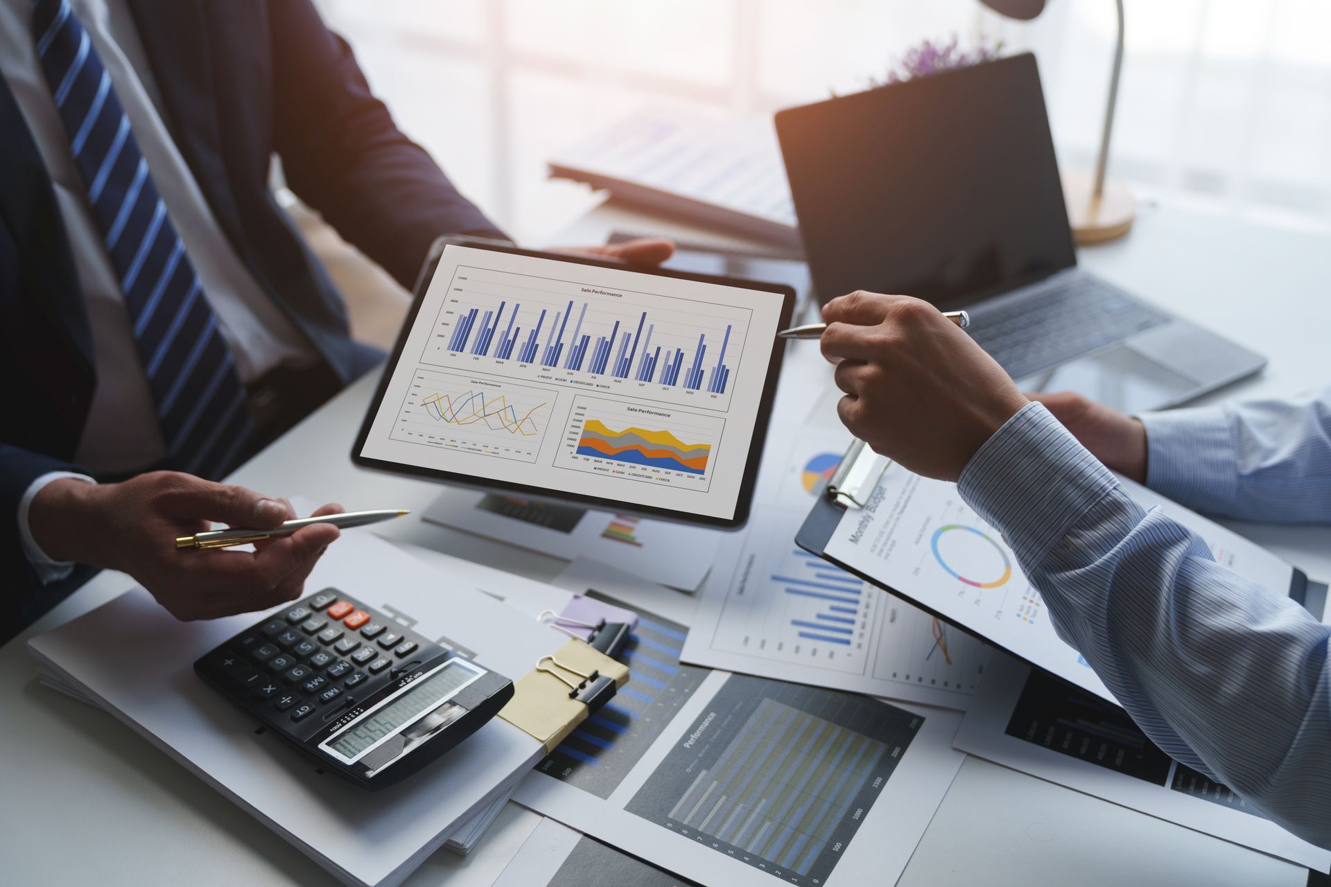 An accountant checking investment results and reviewing financial budget analysis.