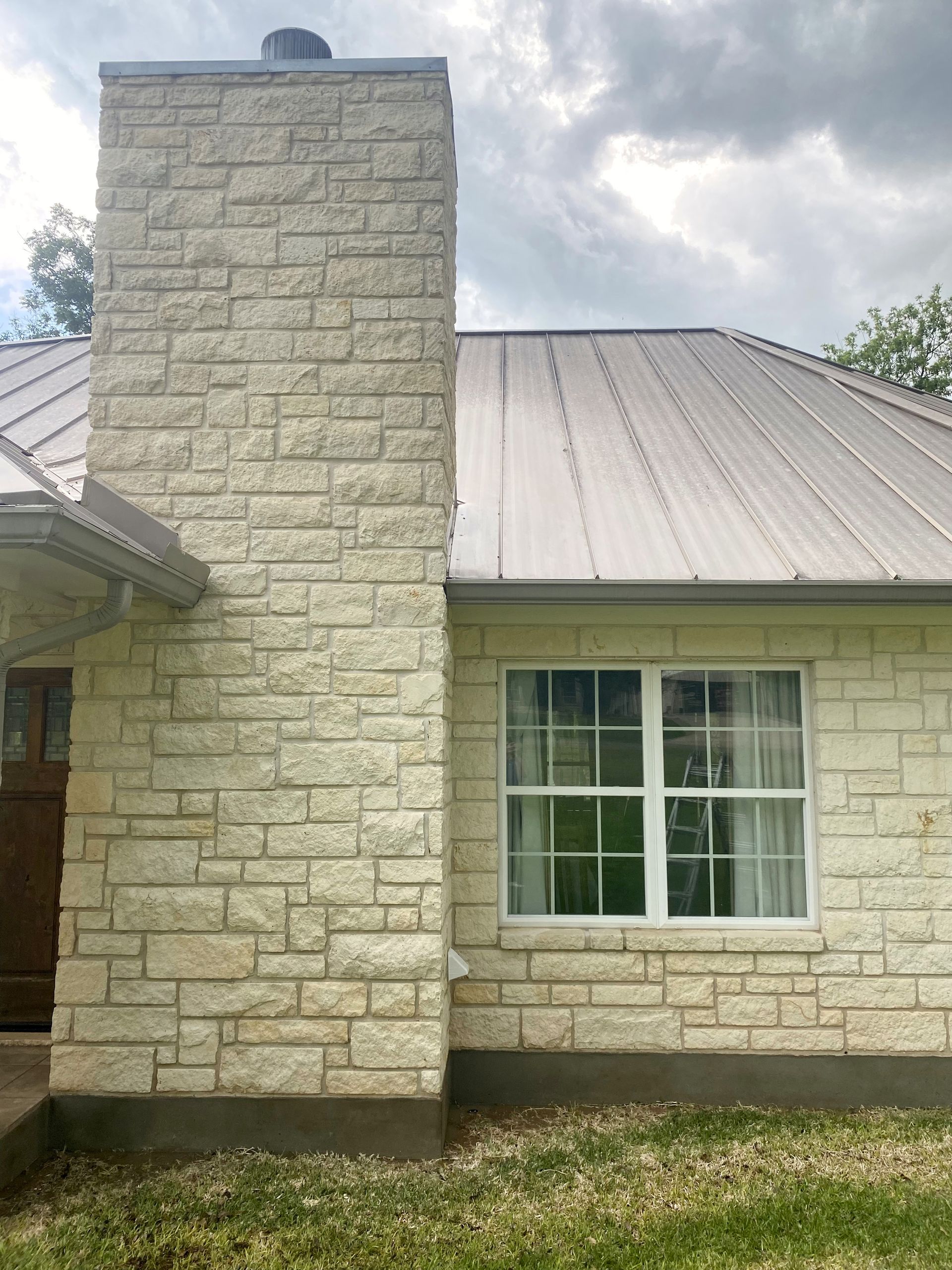 Power washing a house