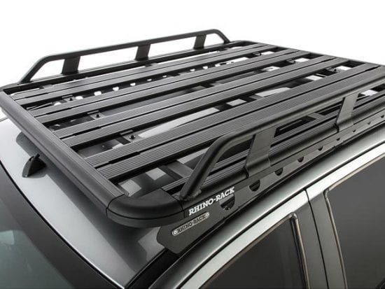 A rhino rack is attached to the roof of a car