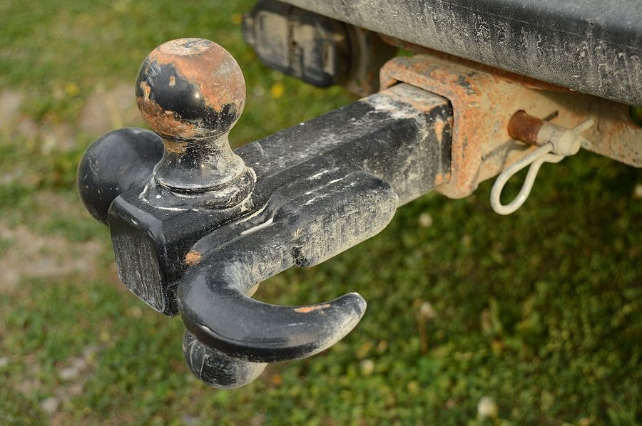 A close up of a tow hook on the back of a truck.