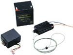 A picture of a battery , charger , and wire.