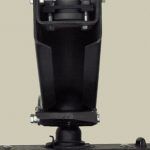 A black object is sitting on top of a table.
