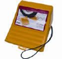 A yellow box with a picture on it and a cord attached to it.