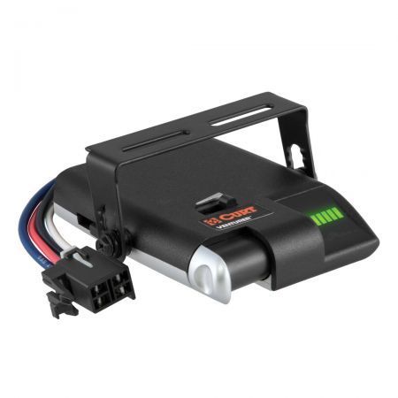 A close up of a brake controller with a green light on it