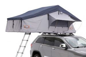 A car with a tent on top of it