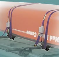 A canoe is attached to the roof of a car with purple straps.