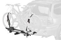 A bike rack is attached to the back of a car.