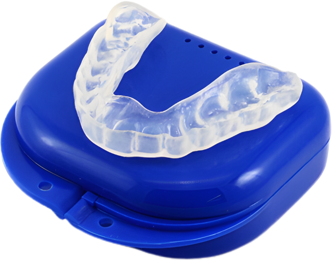 Clear night mouth guard resting on a blue storage case