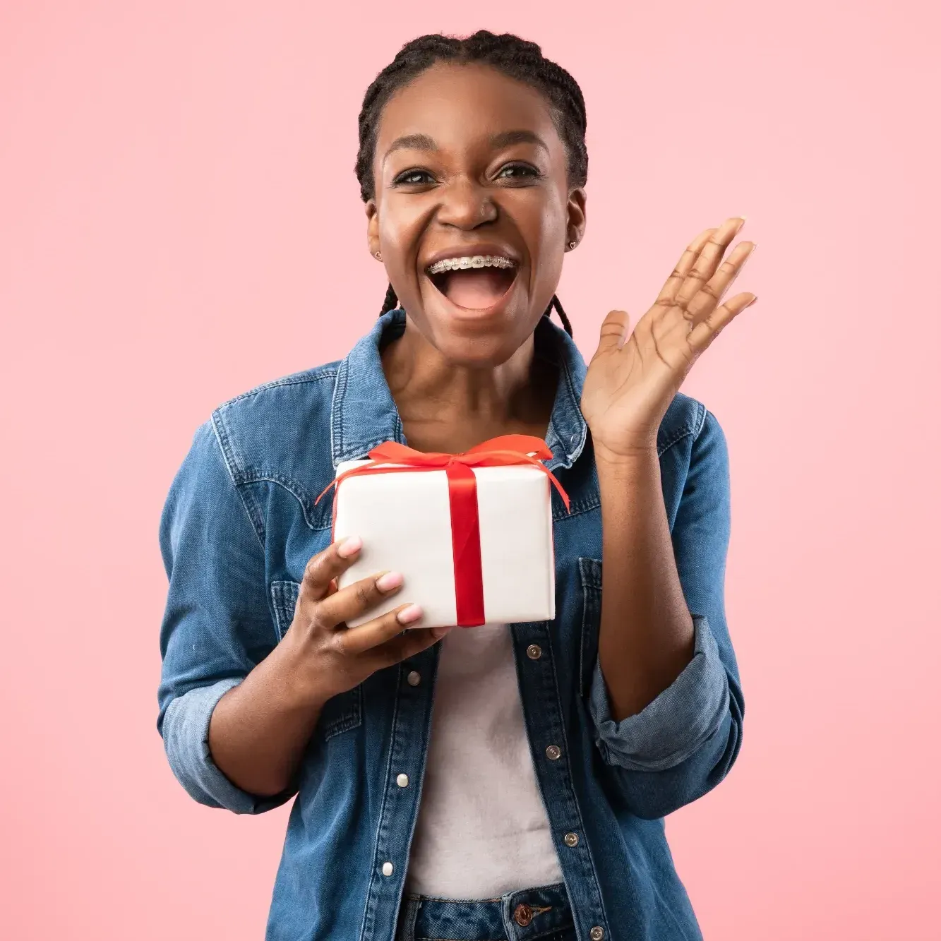teenage girl with her eye closed, smiling