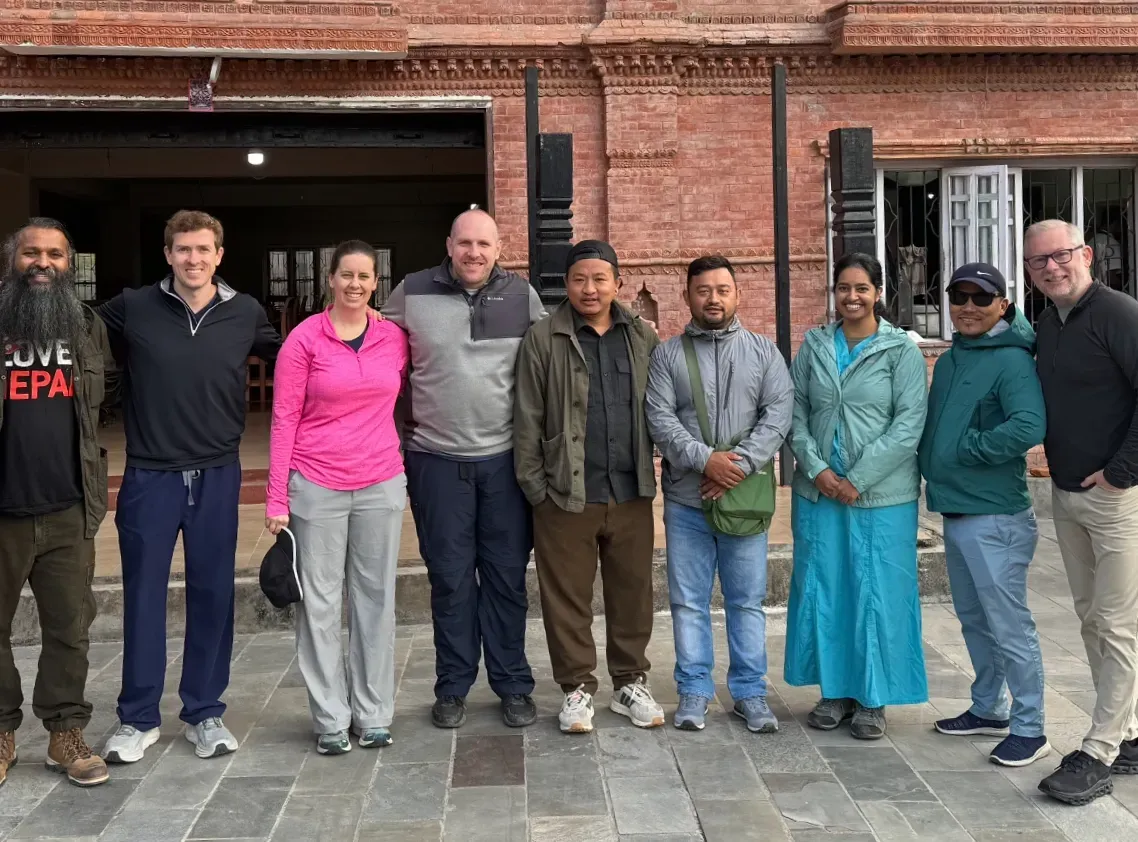 Photo of Dr. Boggan with a team of people on a mission trip in Nepal