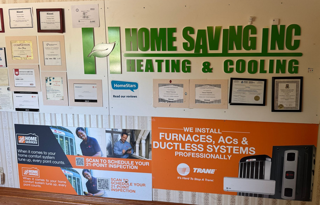 Two people inspecting rows of indoor air conditioners in a bright showroom