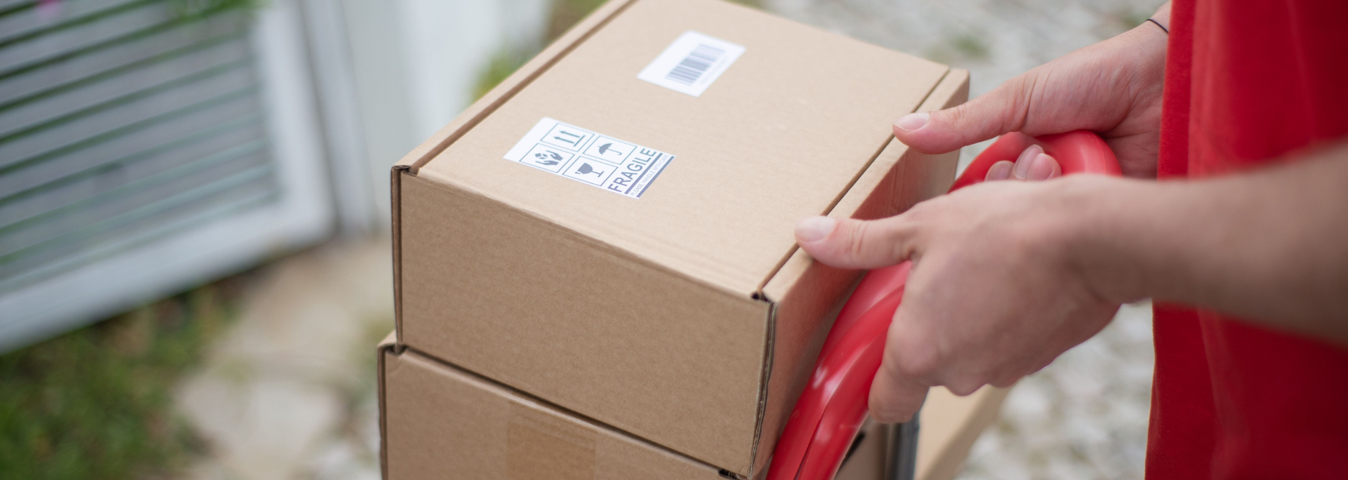 Picture of boxes on a sack truck.