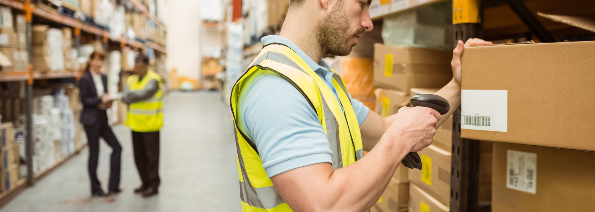 Picture of a person picking goods in a warehouse. Picture of a person picking goods in a warehouse.