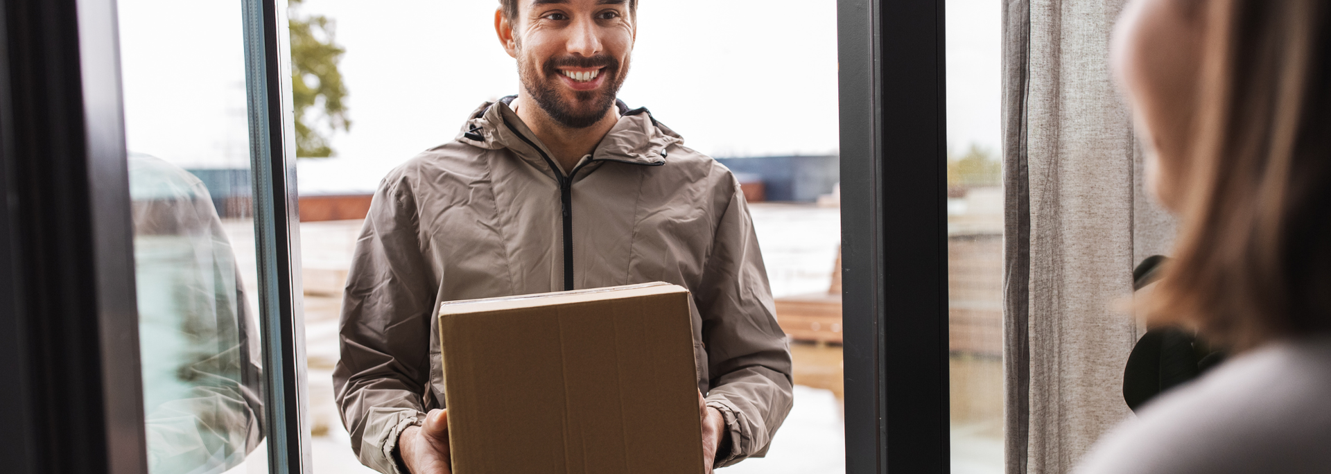 Picture of a person delivering a parcel. Picture of a person delivering a parcel.