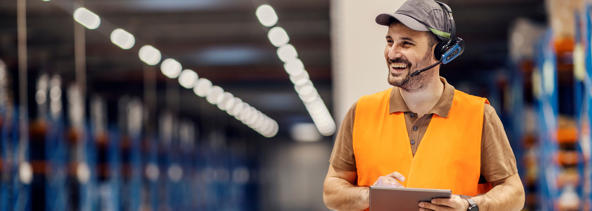 Picture of a worker in a warehouse. Picture of a worker in a warehouse.