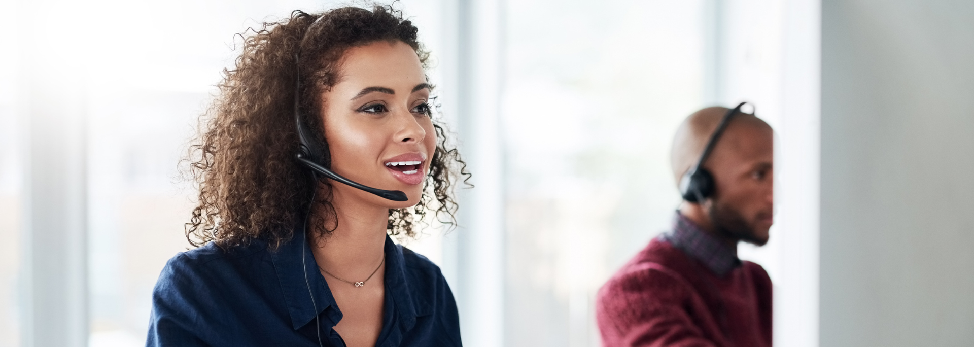 Picture of a young woman answering a call. Picture of a young woman answering a call.