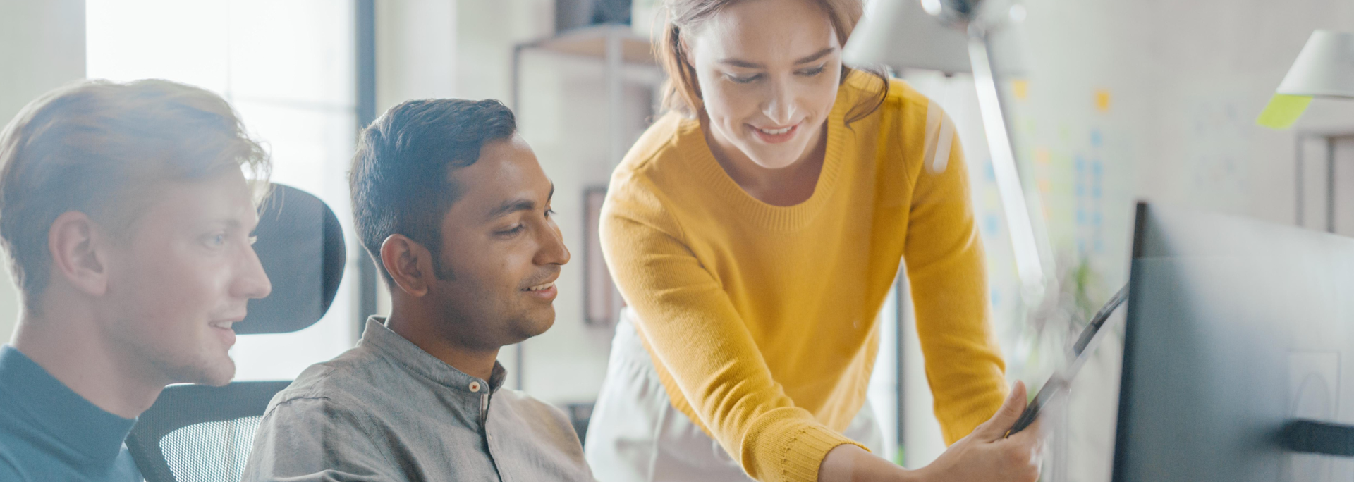 Picture of people working in an office. Picture of people working in an office.