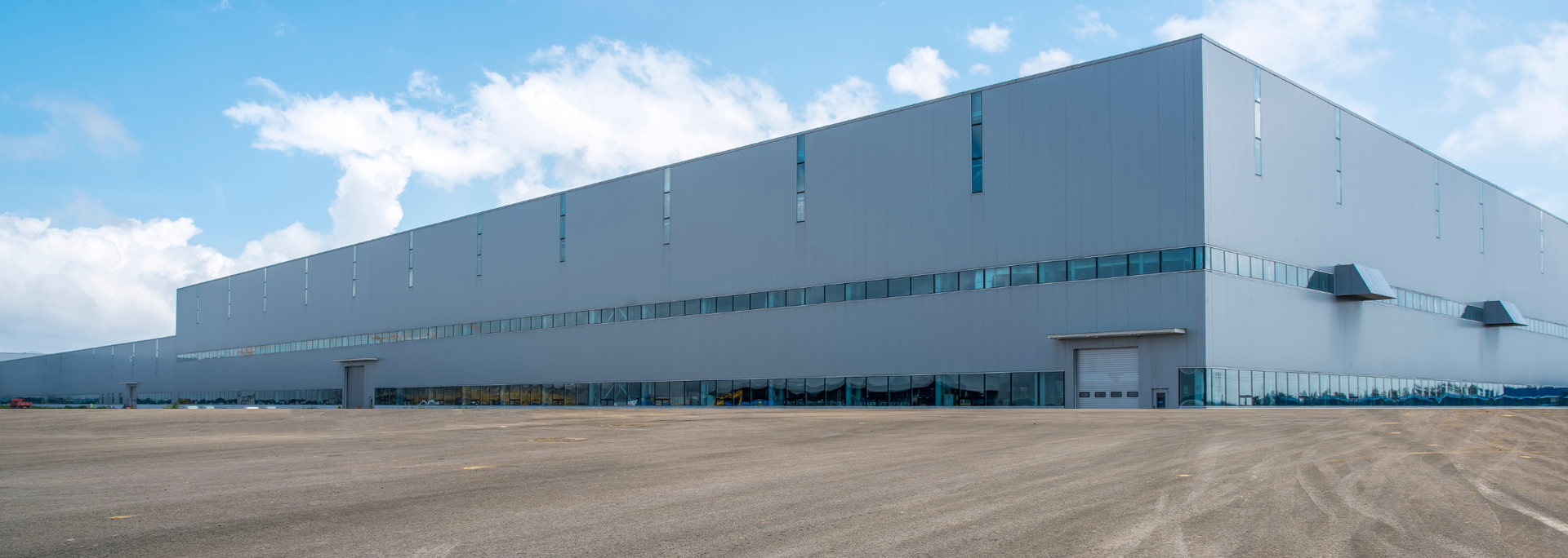 Picture of a warehouse from the outside. Picture of a warehouse from the outside.