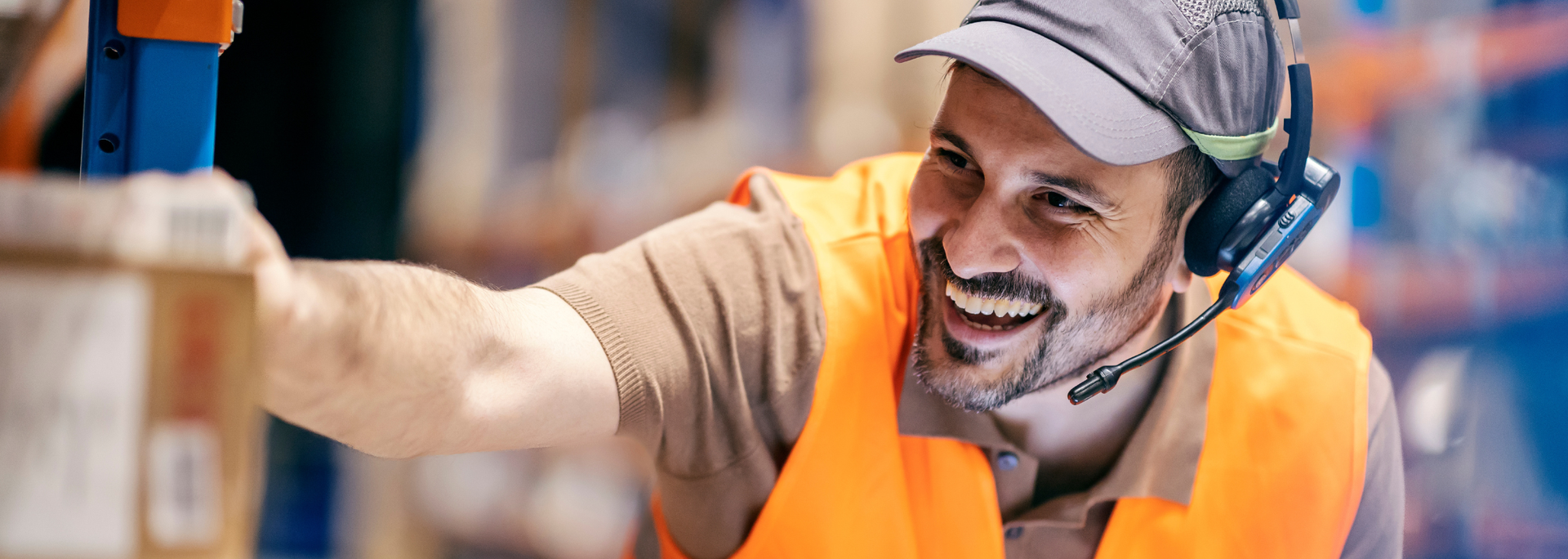 Picture of a warehouse worker using voice picking technology. Picture of a warehouse worker using voice picking technology.