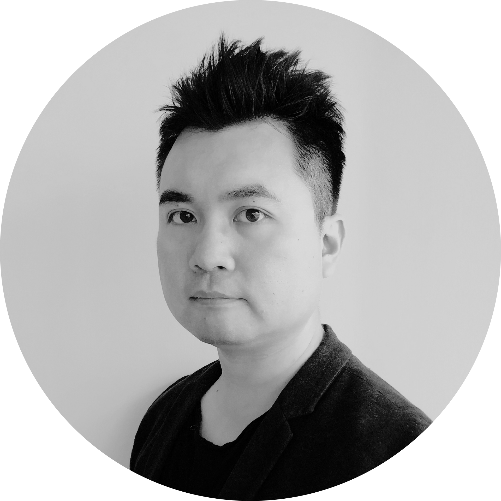一張男人圍成一圈的黑白照片。