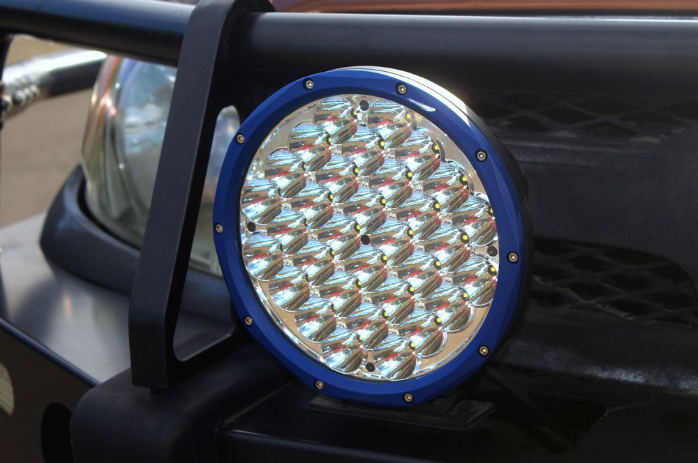 Blue Circular Led Driving Light Mounted On A Vehicle — A-Lect Auto Electrical & Air Conditioning In Garbutt QLD