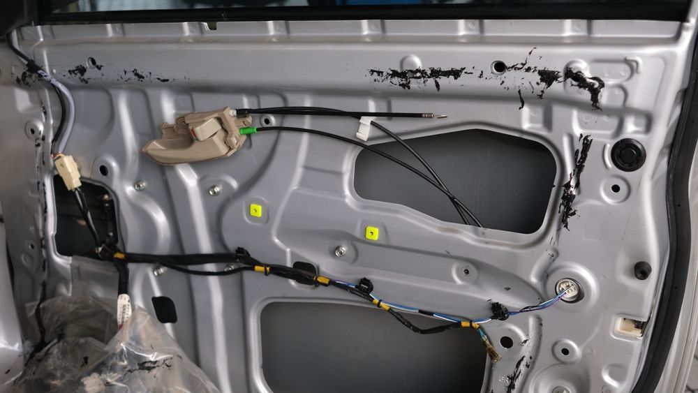 Fixing The-Wiring On The Car Door — A-Lect Auto Electrical & Air Conditioning In Garbutt QLD