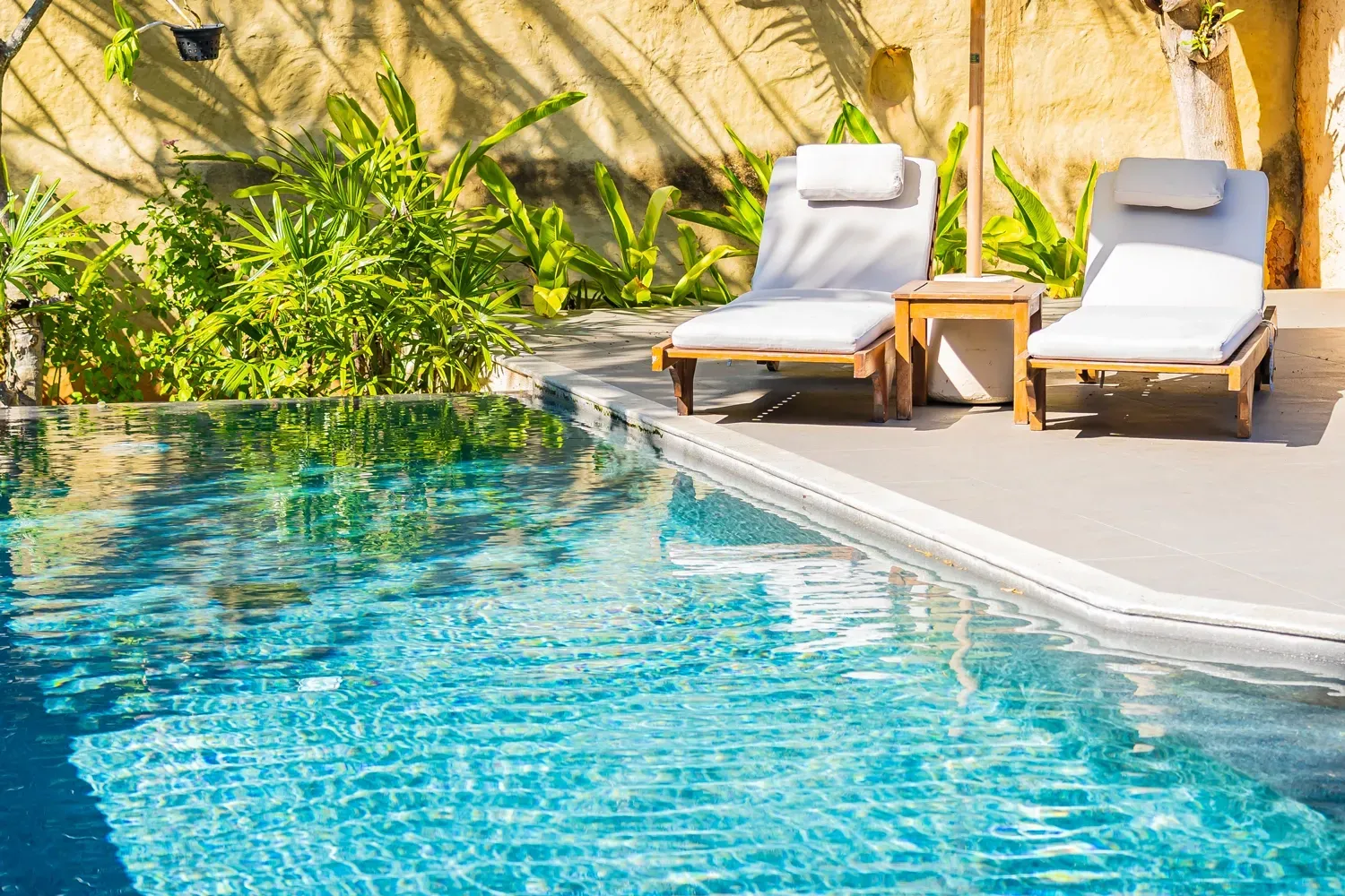 Cleaning swimming pool in Riverside, CA