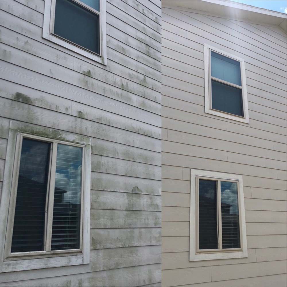 Two-sided house exterior with white siding, showing weathered and clean sections with windows.