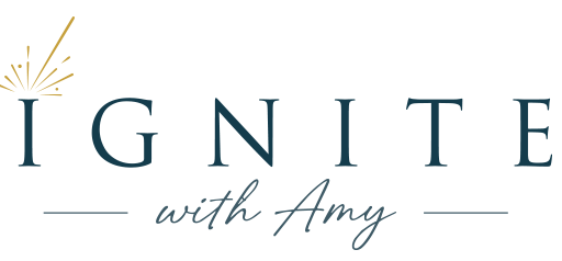 Logo reading “Ignite with Amy” in dark teal and gold with a starburst accent.