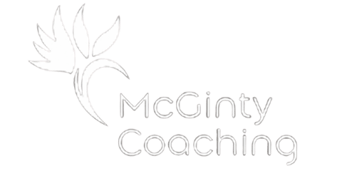 McGinty Coaching logo: a stylized bird of paradise flower with the words