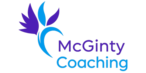 Logo for McGinty Coaching with a purple floral design and blue text.
