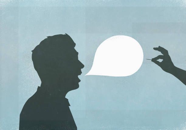 Silhouette of a person speaking with a speech bubble against a blue background