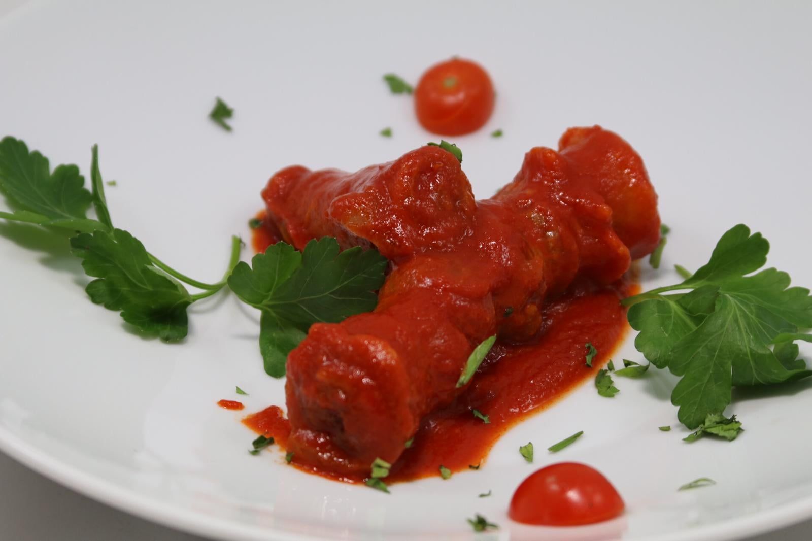 Braciola di cotica di maiale con ragù
