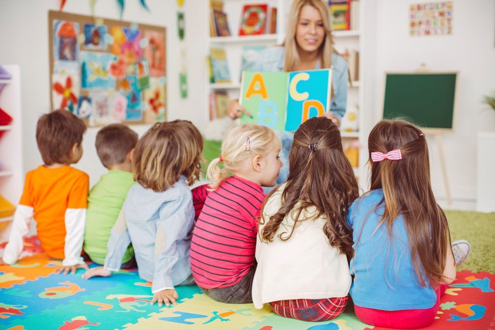 Kids and Teacher in the Classroom — Emu Park, QLD — Coastal Kids