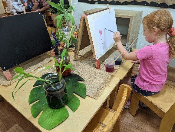 Kindergarten Girl Painting — Emu Park, QLD — Coastal Kids